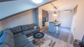Maxim Apartments
